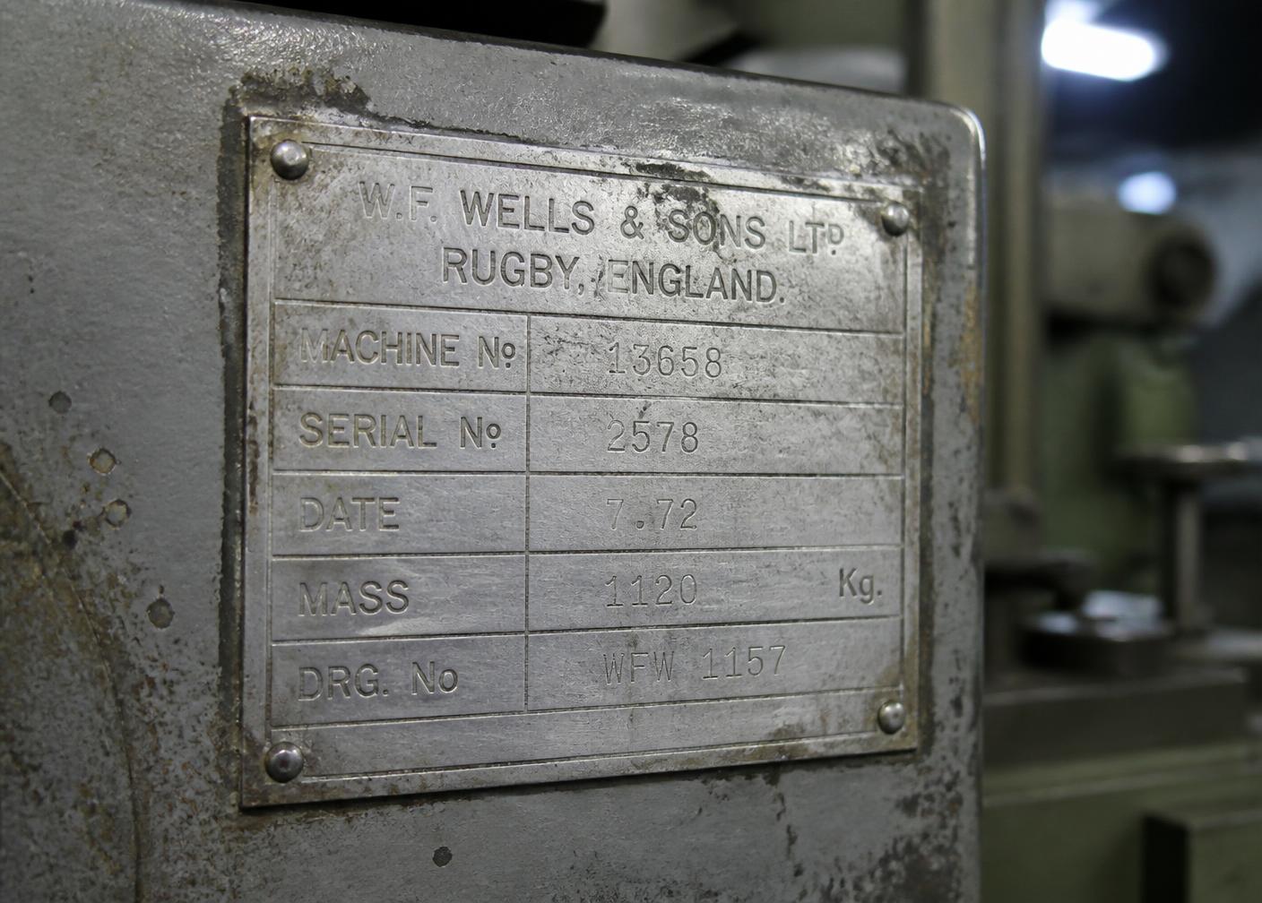 Engraved aluminium identification plate fixed to workshop machinery